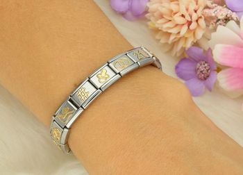 4Złota zawieszka Nomination 'Smoczek' 030109 07 z kolekcji Link 18K – stal szlachetna i 18K złoto. Idealna pamiątka na narodziny dziecka lub prezent dla mamy. Spersonalizuj bransoletkę! (2).jpg